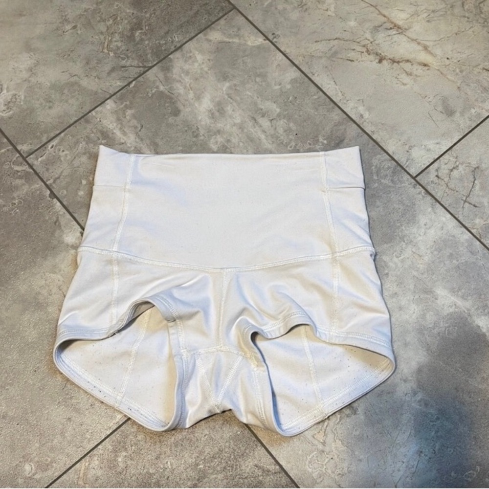 White, high-waisted lululemon shorts. Size tag still attached.